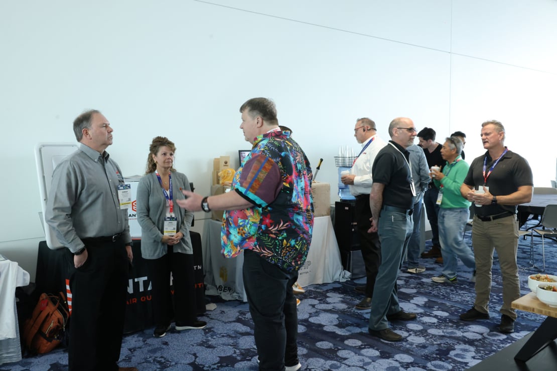 Building professionals and vendors at the Building Science Symposium