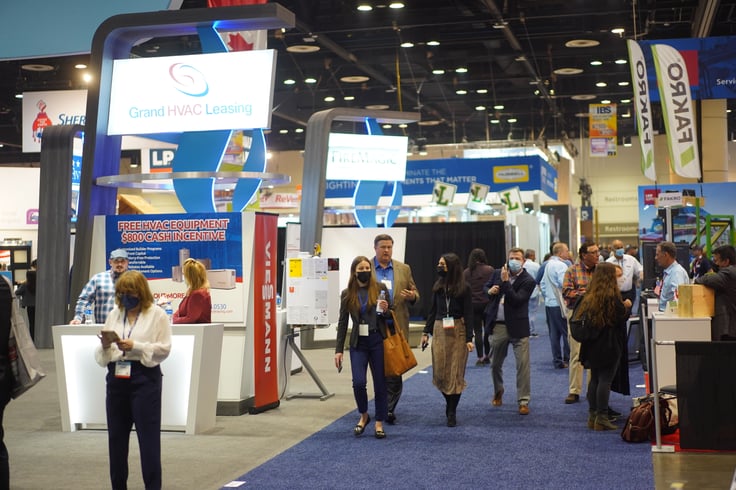 Building professionals walk the Home Technology Zone